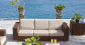 Диван плетеный трехместный Skyline Design Cuatro алюминий, искусственный ротанг, sunbrella бронзовый, бежевый Фото 1